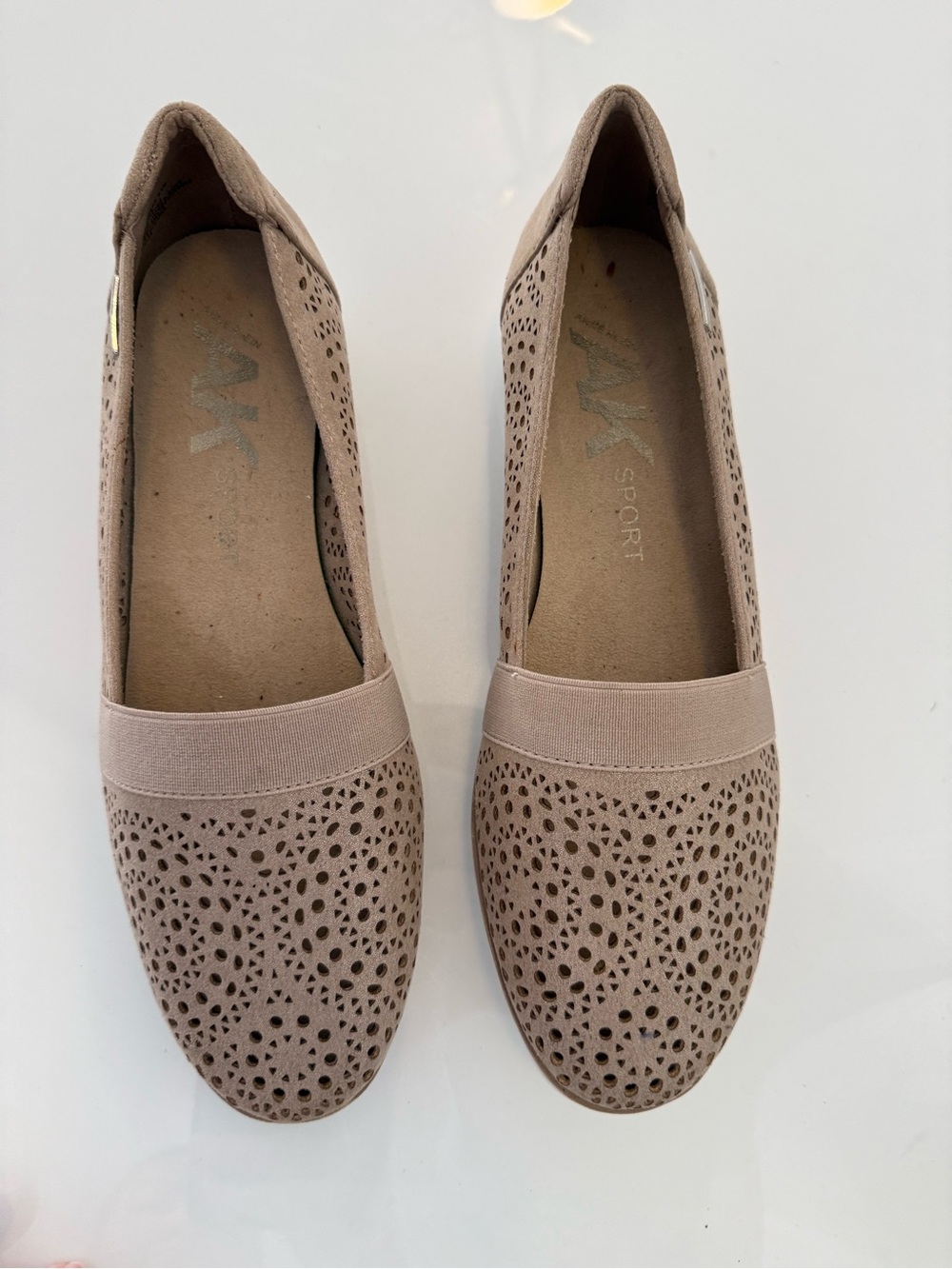 Anne Klein Women's Perforated Elastic-Band Flats in Taupe